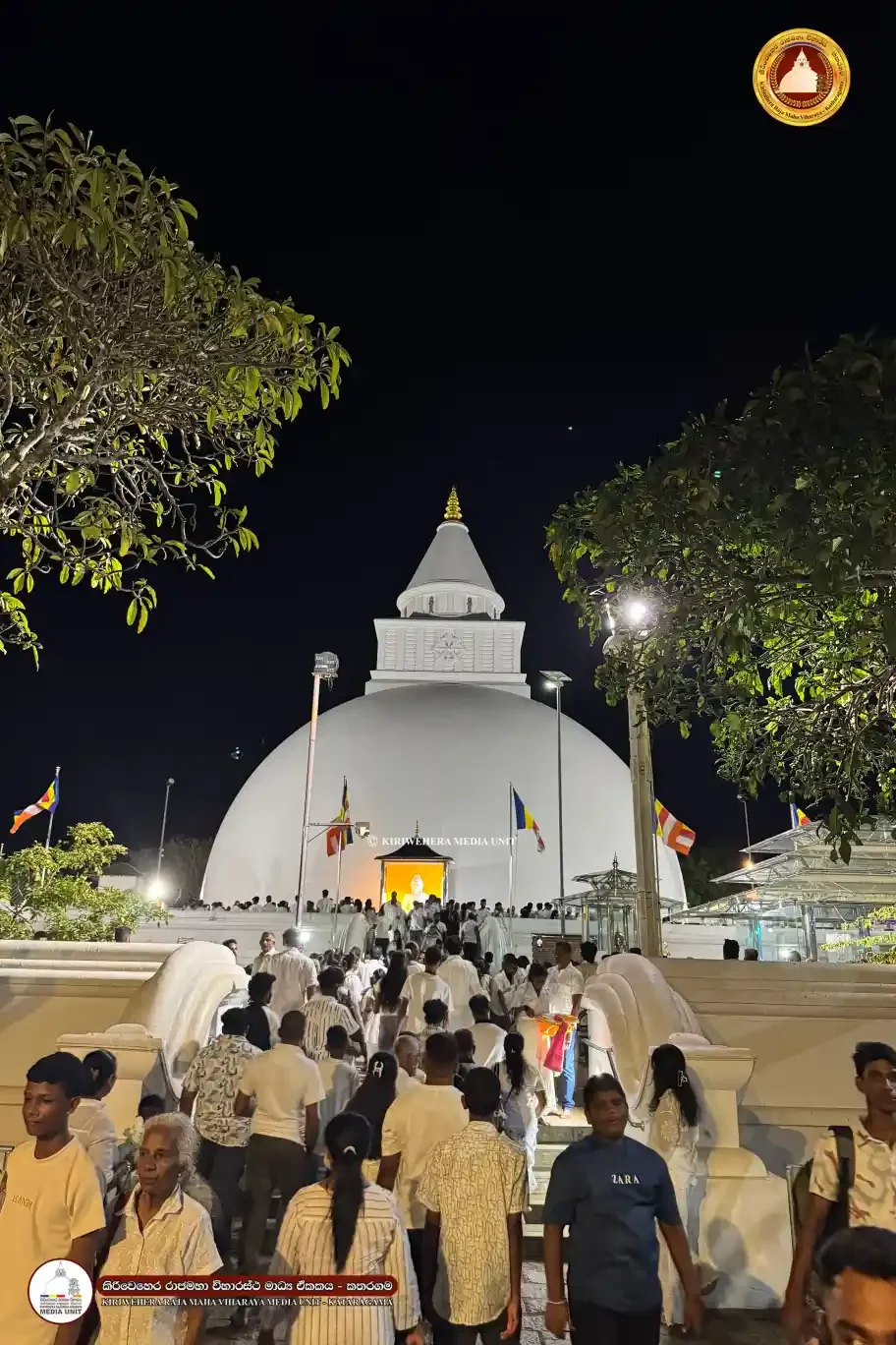 The historic Kataragama Kiriwehera Raja Maha Vihara, filled with devotees on the day before the Niki